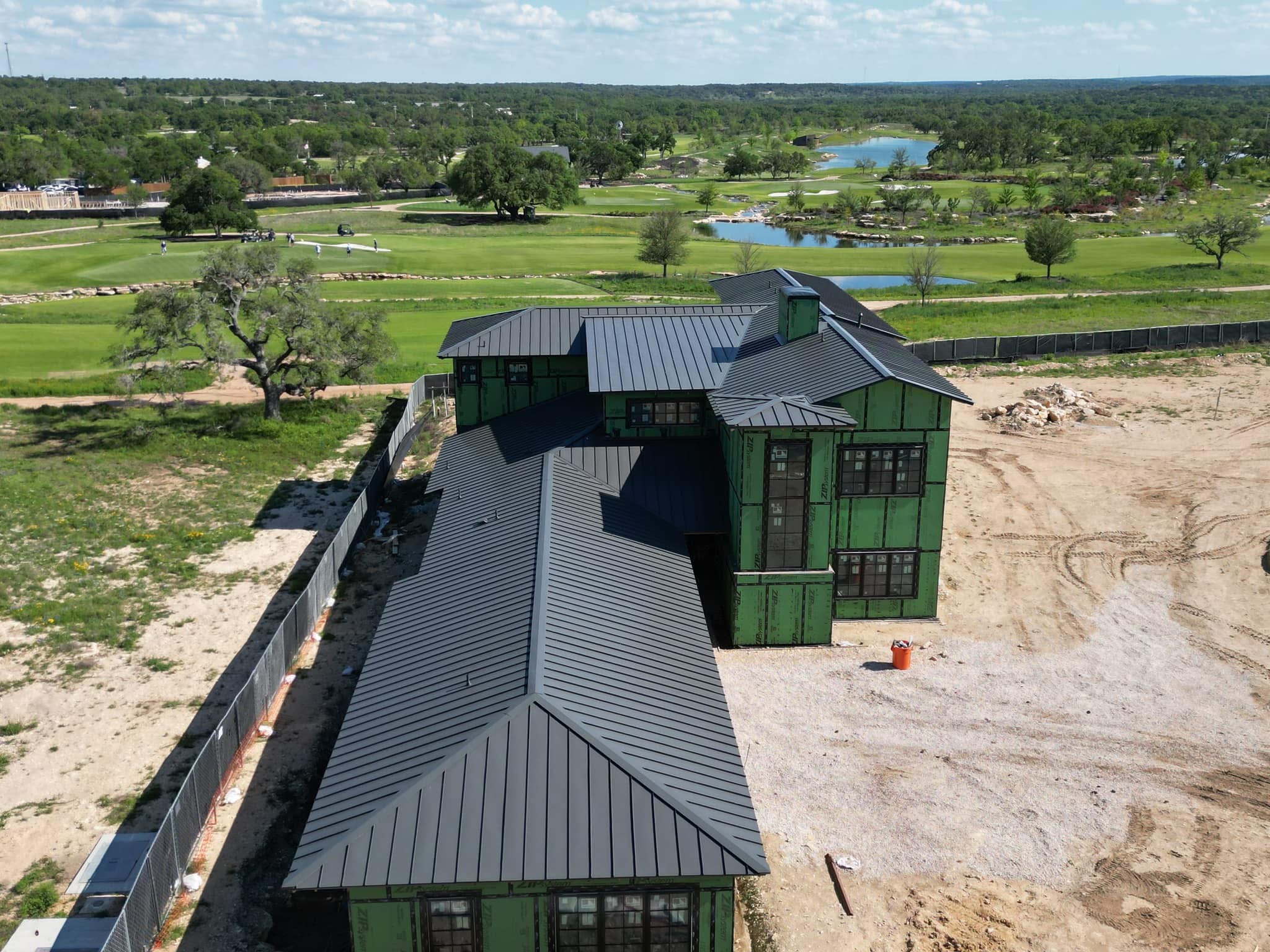 Premium Standing Seam Metal Roof Installed on Golf Course Residence